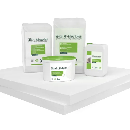 Set aus Kalziumsilikatplatten, Kleber, Spachtel, Grundierung und Farbe auf weißem Hintergrund