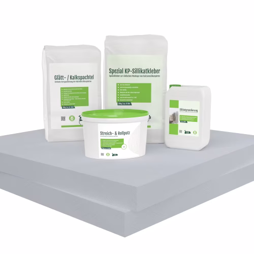 Kombipaket mit Kalziumsilikatplatten, Kleber, Spachtel, Grundierung und Farbe auf grauer Oberfläche